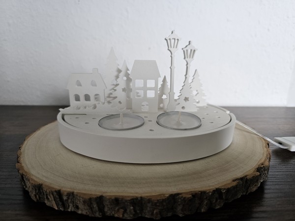 Winterlandschaft mit Teelichtern